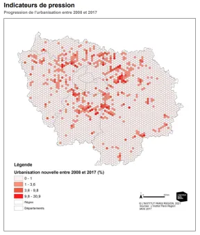 Cette carte illustre avec des points rouges de couleurs plus ou moins intenses le taux d'urbanisation nouvelle sur des maills fines d'Île-de-France entre 2008 et 2017. Les points rouges sont plus nombreux en grande couronne, limite de petite couronne.